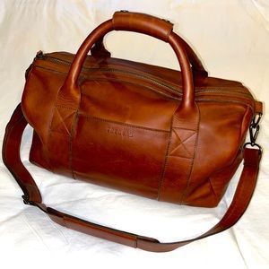 TECOVAS weekend bag. Leather exterior with fabric interior. Like new.
